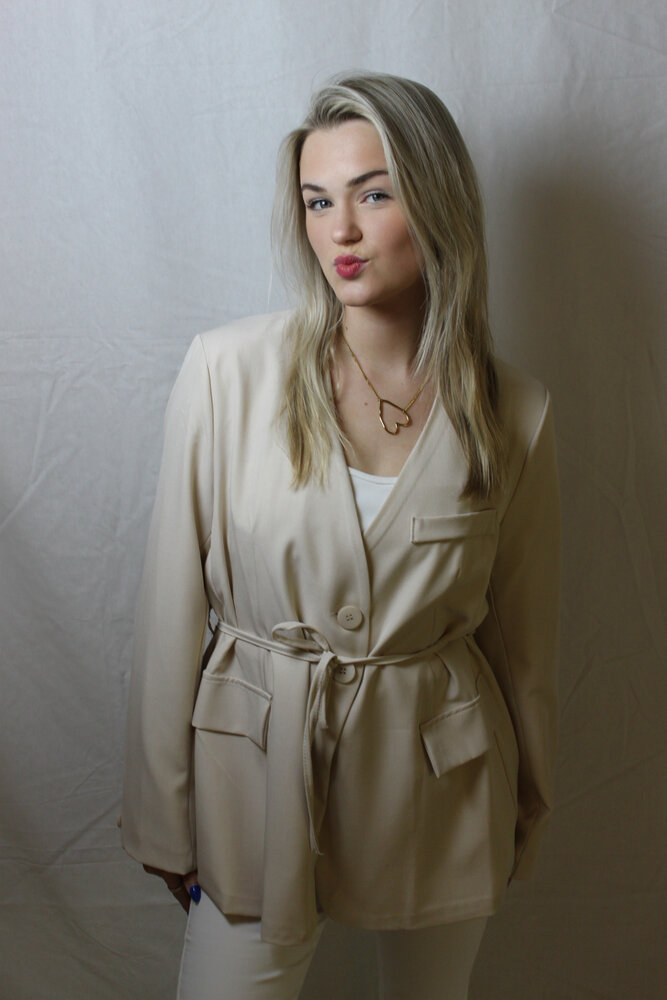 Beige blazer tied