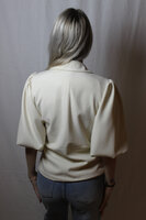 Beige blazer with bow