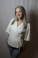 White blazer with bow