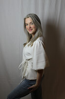 White blazer with bow
