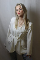 White blazer tied