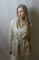 Beige blazer tied
