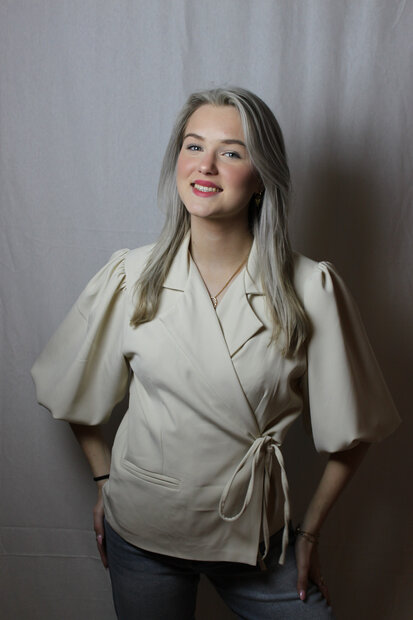 Beige blazer with bow