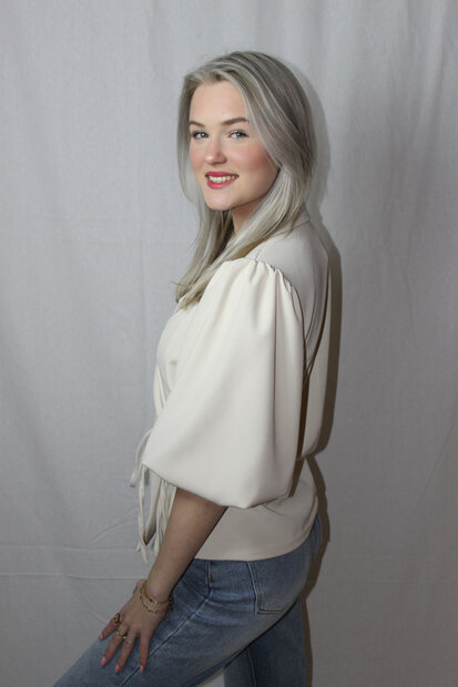 Beige blazer with bow