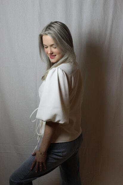 White blazer with bow