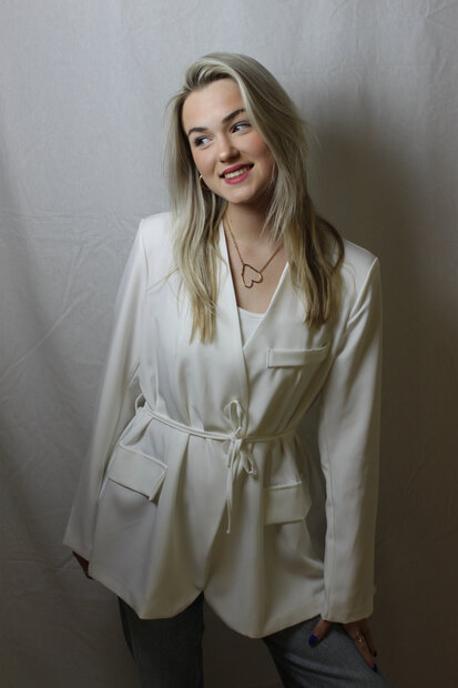 White blazer tied
