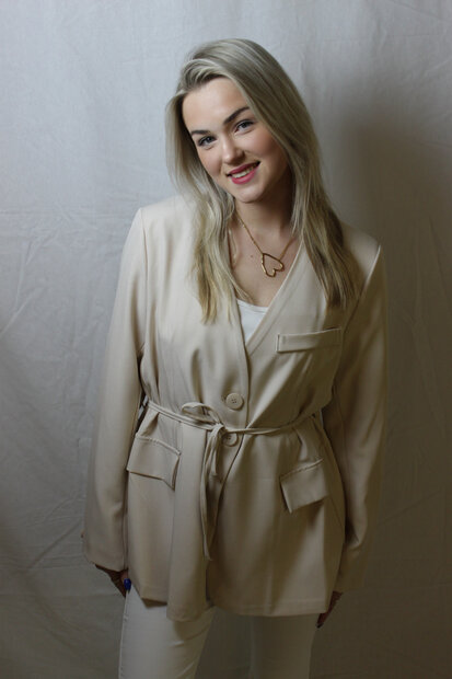 Beige blazer tied